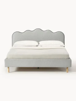 Letto imbottito con testiera ondulata Romy