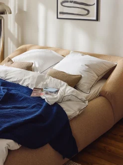 Letto imbottito in bouclé Sofia