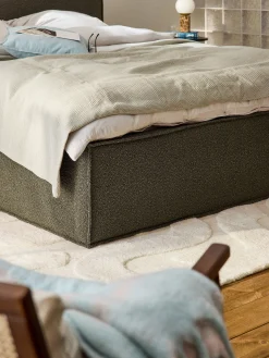 Letto imbottito in bouclé con contenitore Dream