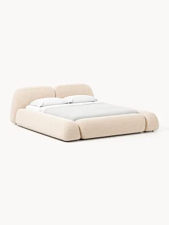 Letto imbottito in bouclé con contenitore Wolke