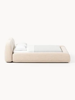 Letto imbottito in bouclé con contenitore Wolke
