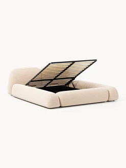 Letto imbottito in bouclé con contenitore Wolke