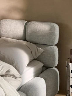 Letto imbottito in bouclé con contenitore Tayla