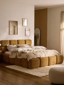 Letto imbottito in teddy bouclé con spazio contenitore aggiuntivo Tayla