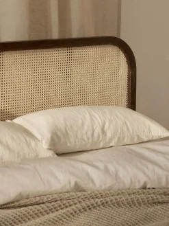 Letto in legno con testiera in vimini Jones