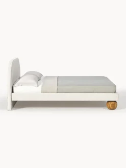 Letto imbottito con piedini rotondi in legno di quercia Rena