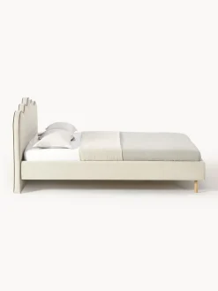 Letto imbottito con testiera ondulata Romy
