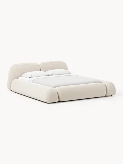 Letto imbottito in bouclé con contenitore Wolke