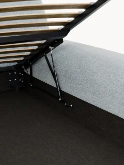 Letto imbottito in bouclé con contenitore Wolke