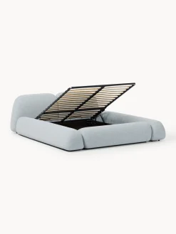 Letto imbottito in bouclé con contenitore Wolke
