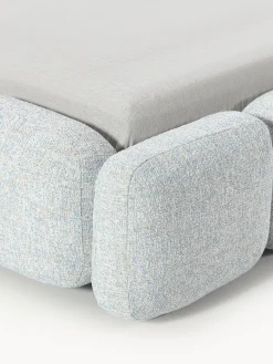 Letto imbottito in bouclé con contenitore Tayla