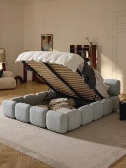 Letto imbottito in bouclé con contenitore Tayla