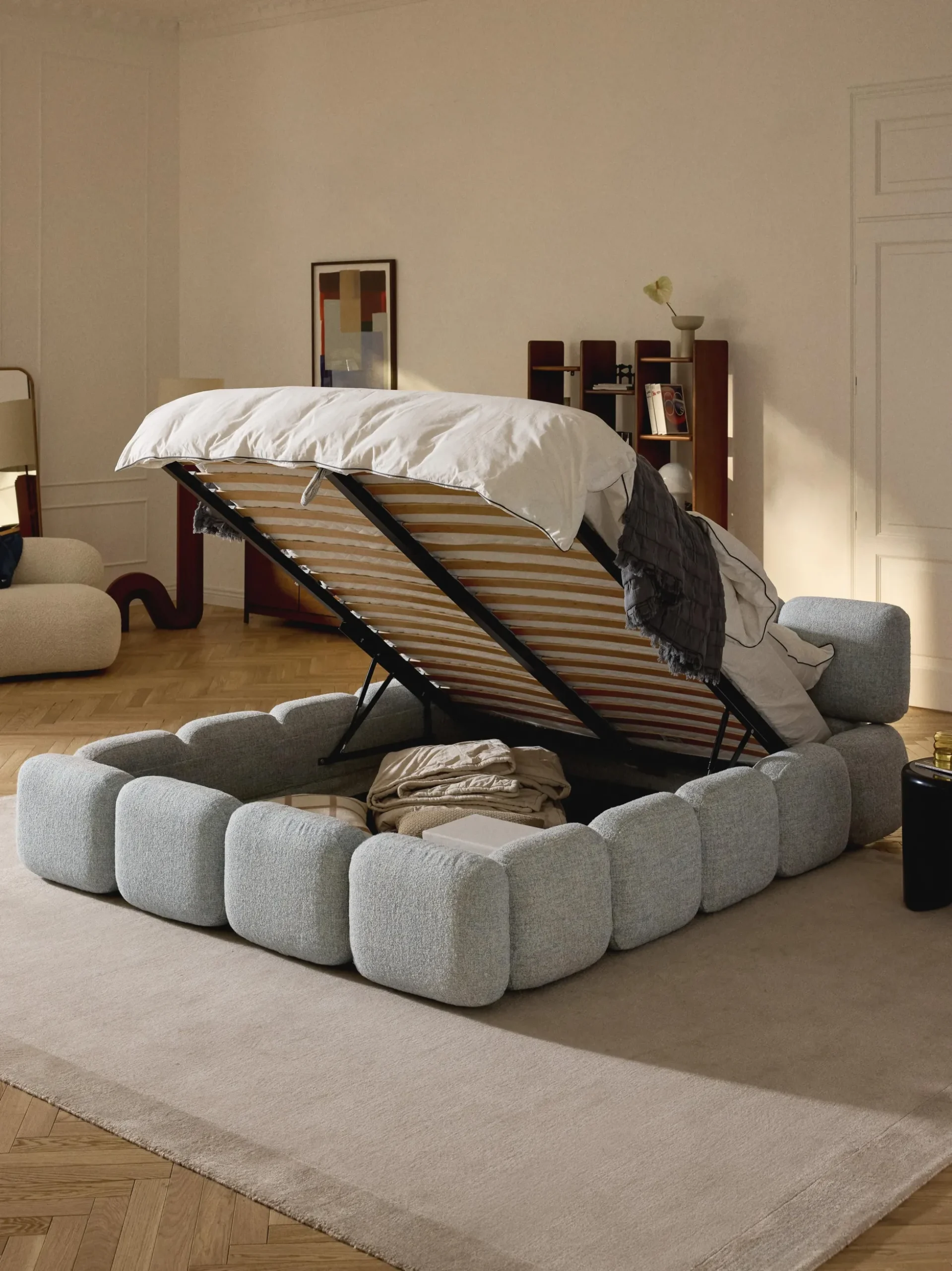 Letto imbottito in bouclé con contenitore Tayla