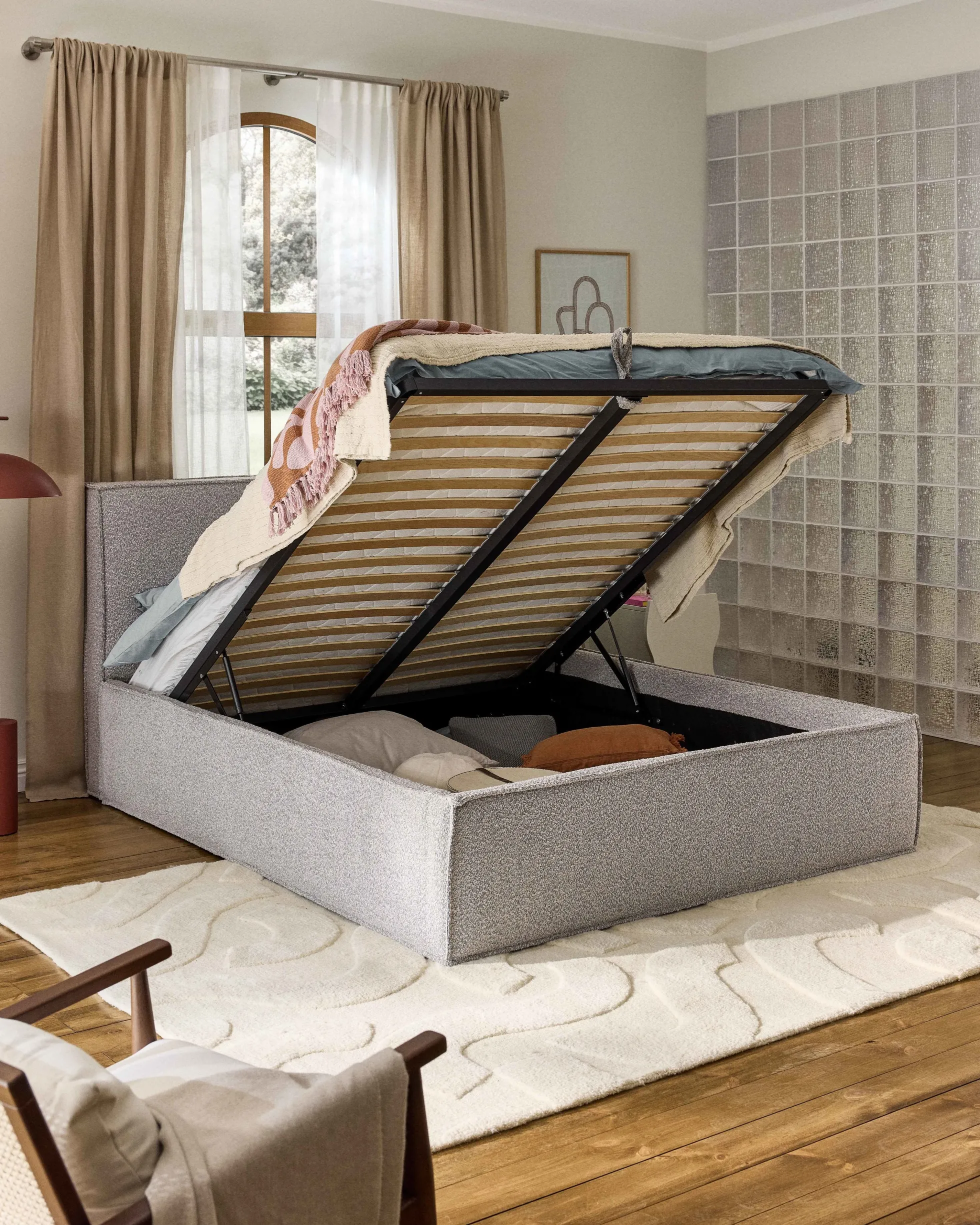 Letto imbottito in bouclé con contenitore Dream