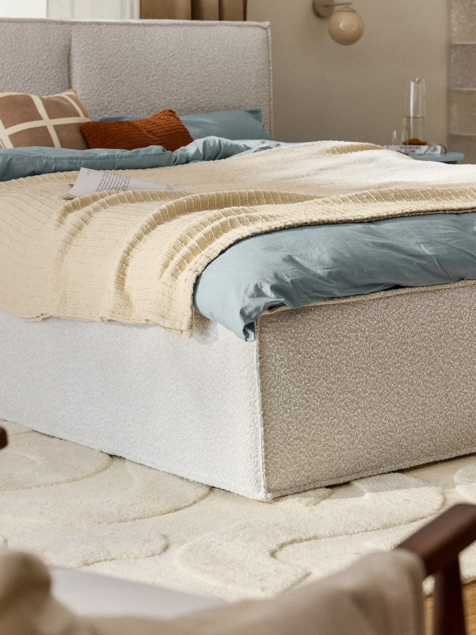 Letto imbottito in bouclé con contenitore Dream