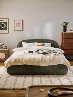 Letto imbottito in teddy bouclé con contenitore Alba