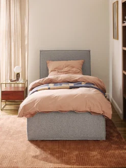 Letto singolo imbottito in bouclé con contenitore Dream