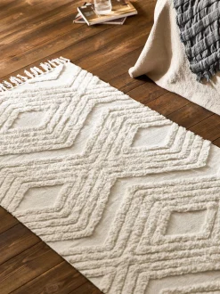 Passatoia in cotone tessuta a mano con struttura in rilievo Ziggy