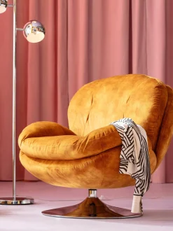Poltrona girevole in velluto Cosy