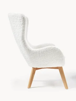 Poltrona in teddy con gambe in legno Wing