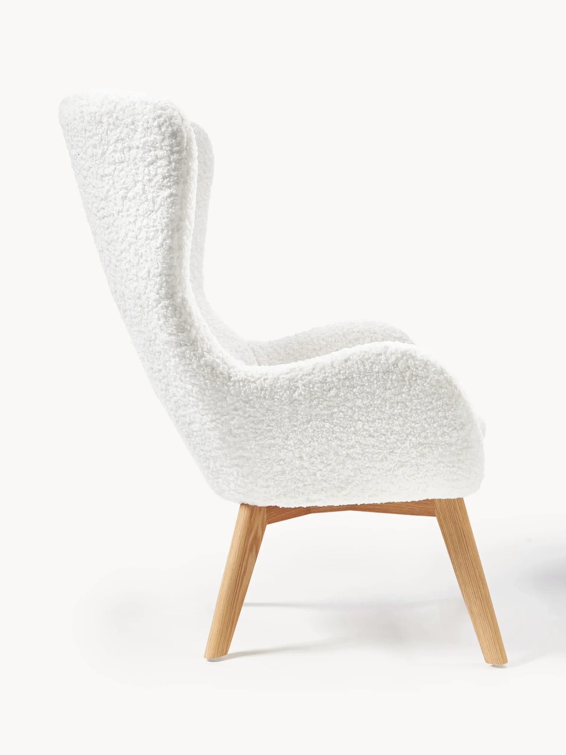 Poltrona in teddy con gambe in legno Wing