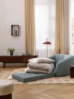 Poltrona letto in bouclé Eliot