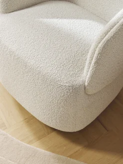 Poltrona girevole in bouclé Irene