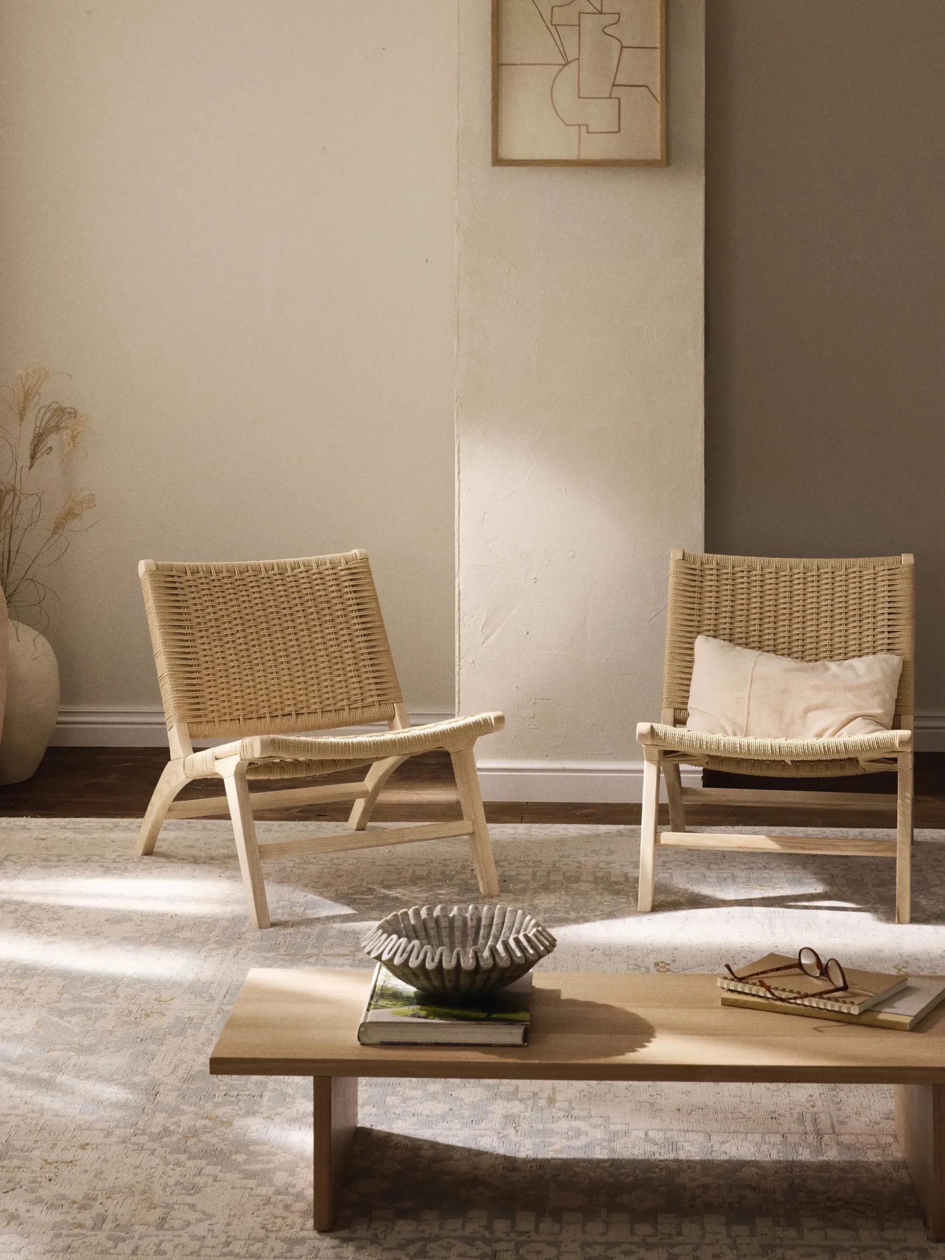 Poltrona lounge con intreccio in rattan in legno di frassino Ira