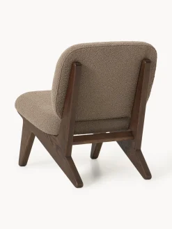 Poltrona lounge in legno di frassino con rivestimento in bouclé Shenay