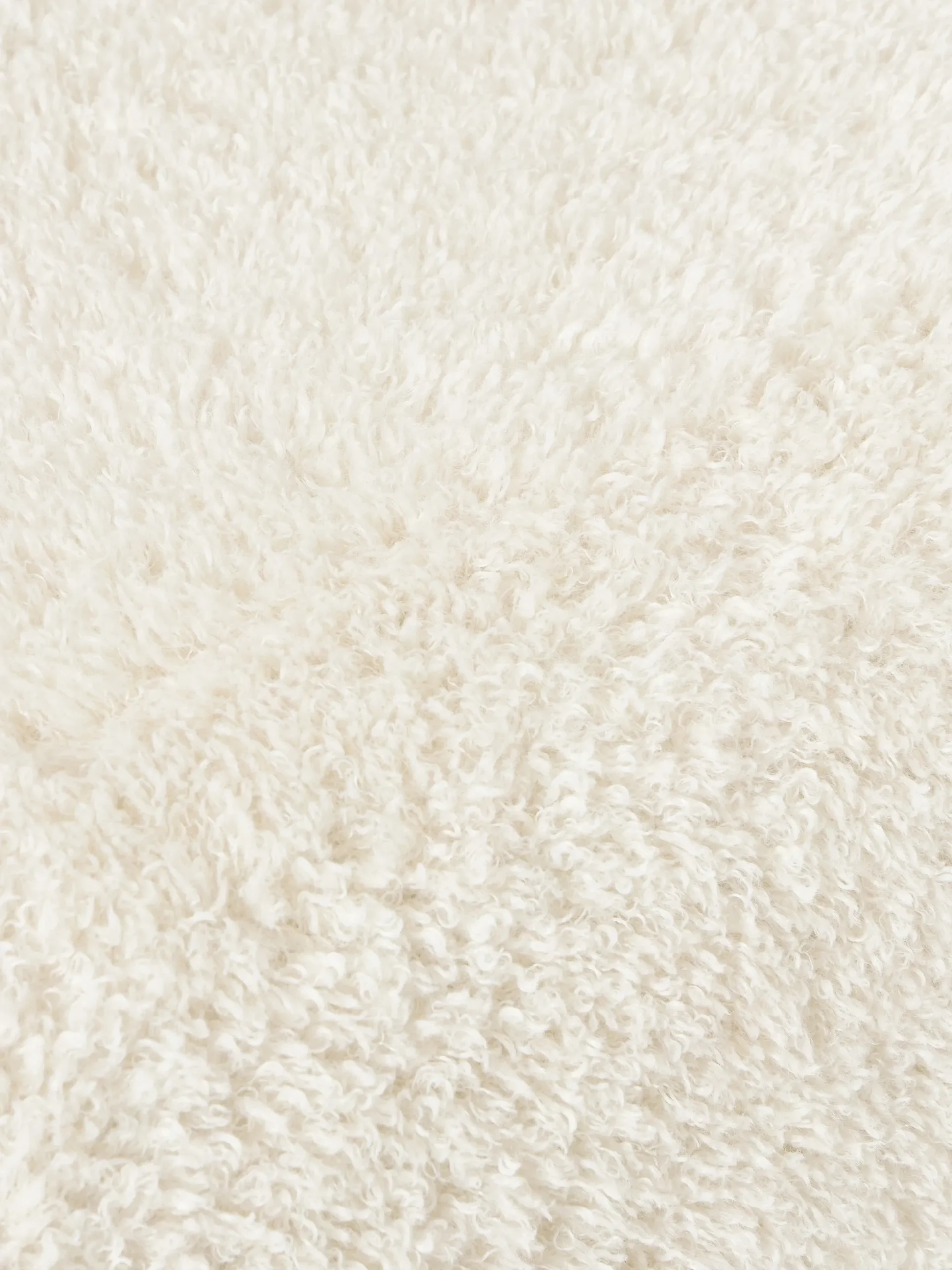 Pouf ovale in teddy Wolke