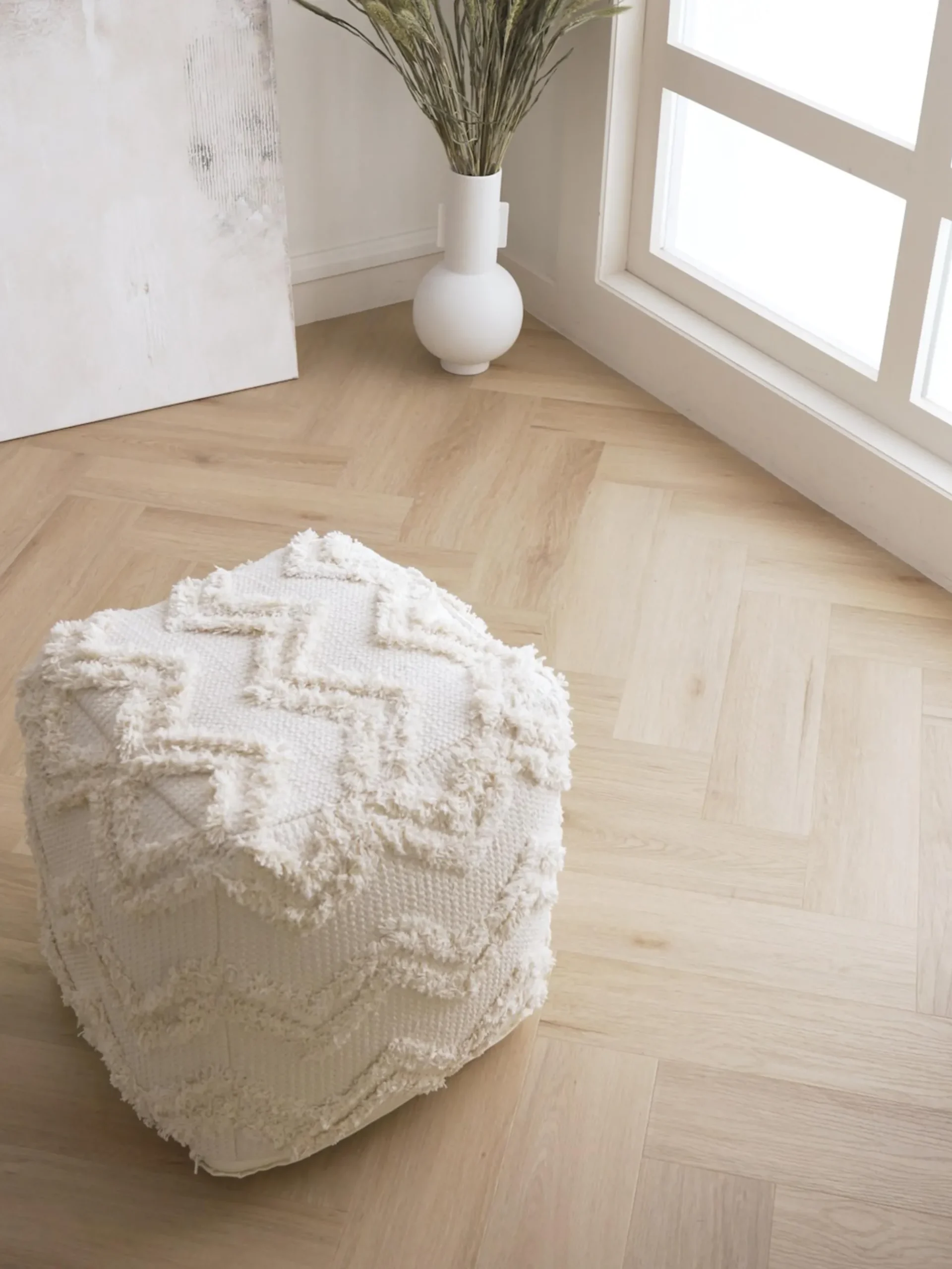 Pouf con motivo trapuntato a zigzag Akesha