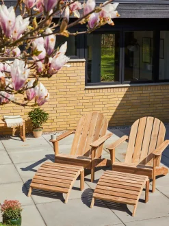 Sedia a sdraio da giardino in legno di teak fatta a mano con sgabello Adirondack