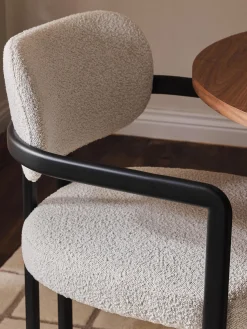 Sedia con braccioli in bouclé Adrien