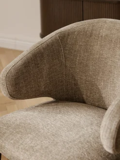 Sedia con braccioli in bouclé Celia
