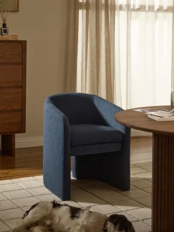 Sedia con braccioli in bouclé Mairo