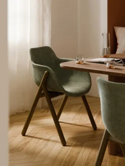 Sedia con braccioli imbottita Carmi