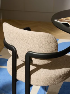 Sedia con braccioli in bouclé Adrien
