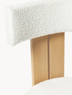 Sedia in legno con rivestimento bouclé Katya