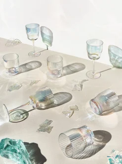 Set di 4 bicchieri in vetro soffiato con rilievo rigato e lucentezza madreperlacea Juno