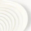Set di 4 piatti a forma di conchiglia in porcellana Andrina