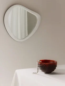 Specchio da parete con cornice in marmo Meringue