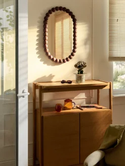 Specchio ovale da parete con cornice in legno di acacia Ayu