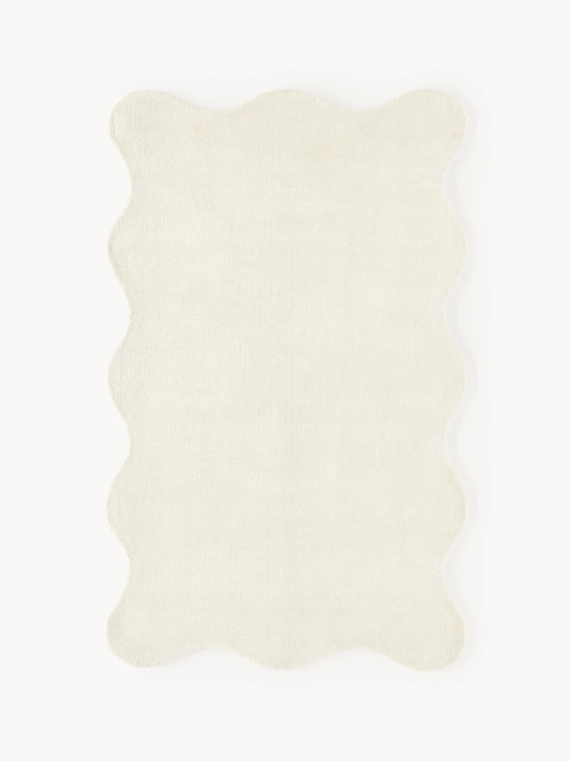 Tappeto tessuto a mano con bordo ondulato Wavy