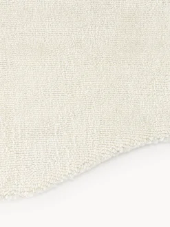 Tappeto tessuto a mano con bordo ondulato Wavy