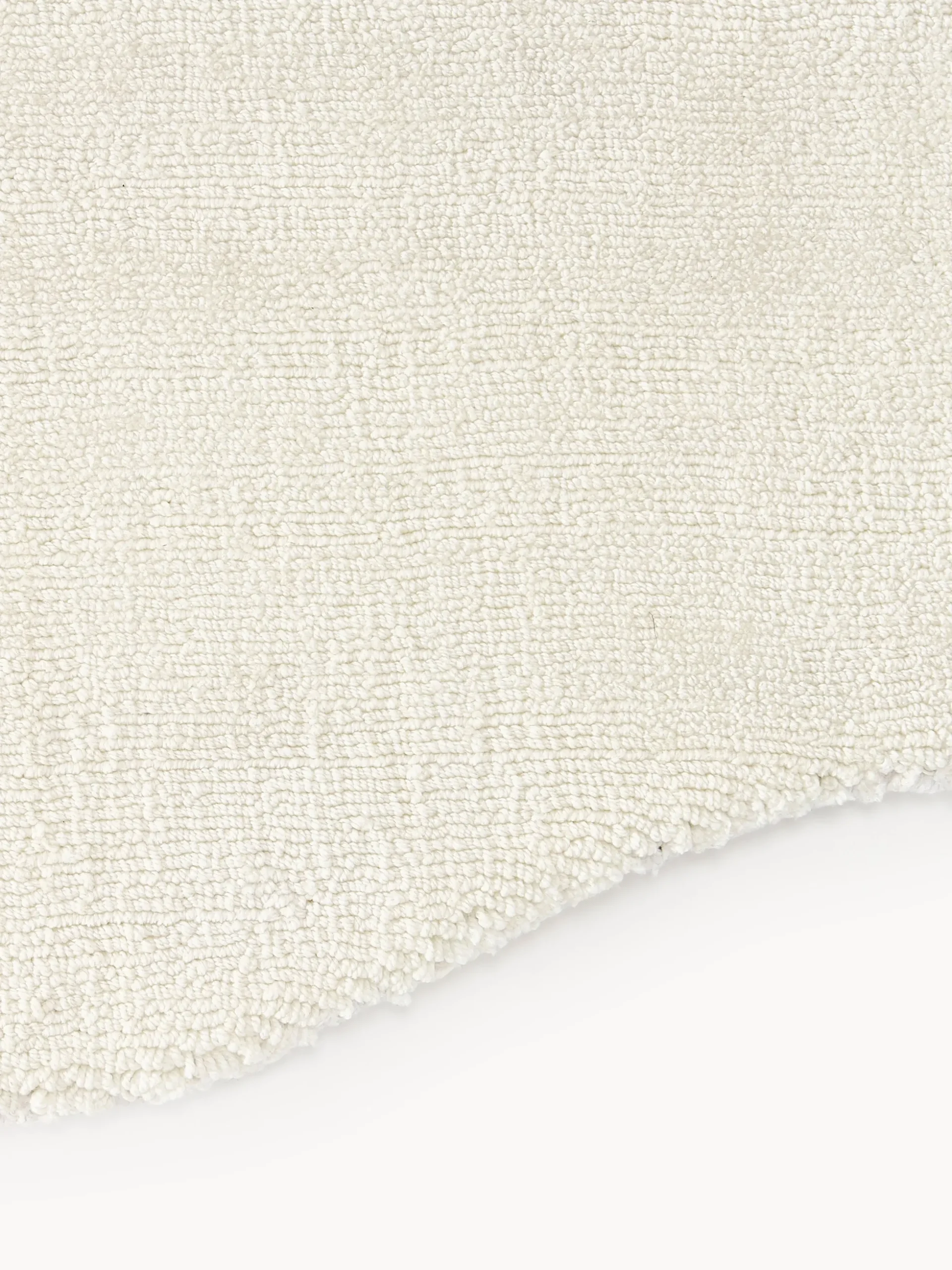 Tappeto tessuto a mano con bordo ondulato Wavy