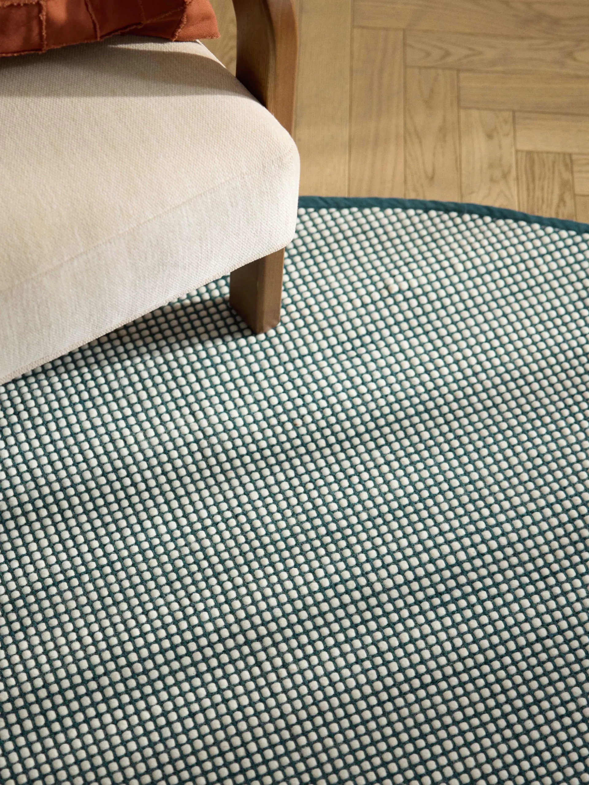 Tappeto rotondo in lana tessuto a mano Amaro